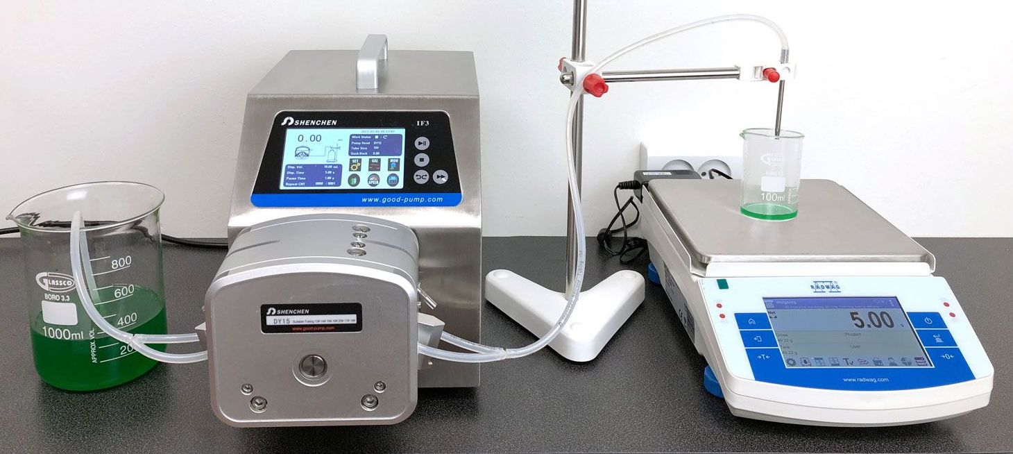 A low pulsation peristaltic pump IF3 together with a laboratory balance